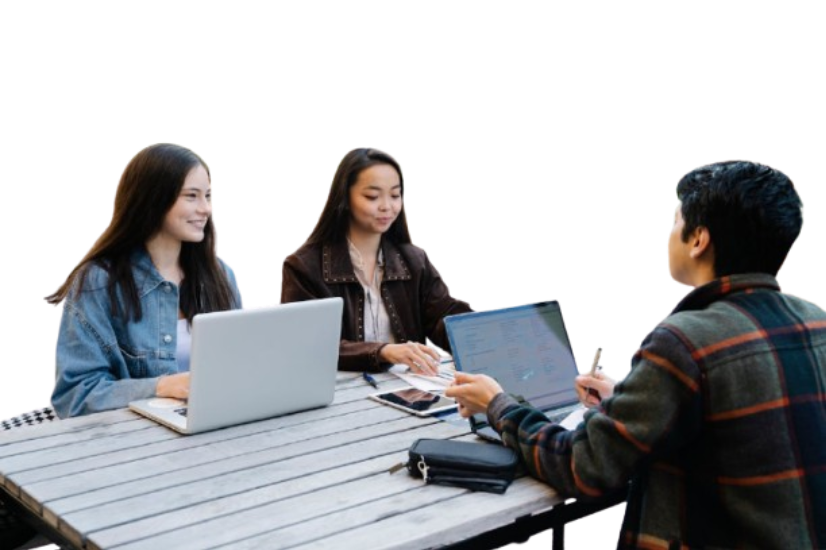 3 Students around a table